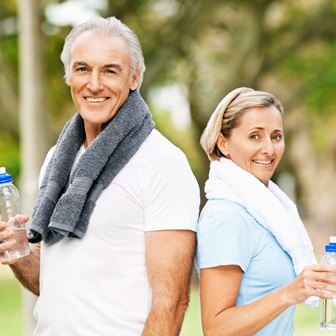 older man and woman in workout gear