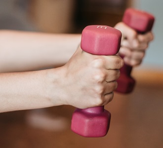 person holding weights